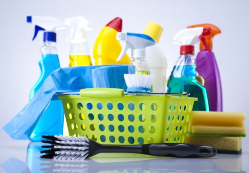 Carpet cleaning team preparing equipment safely before work begins